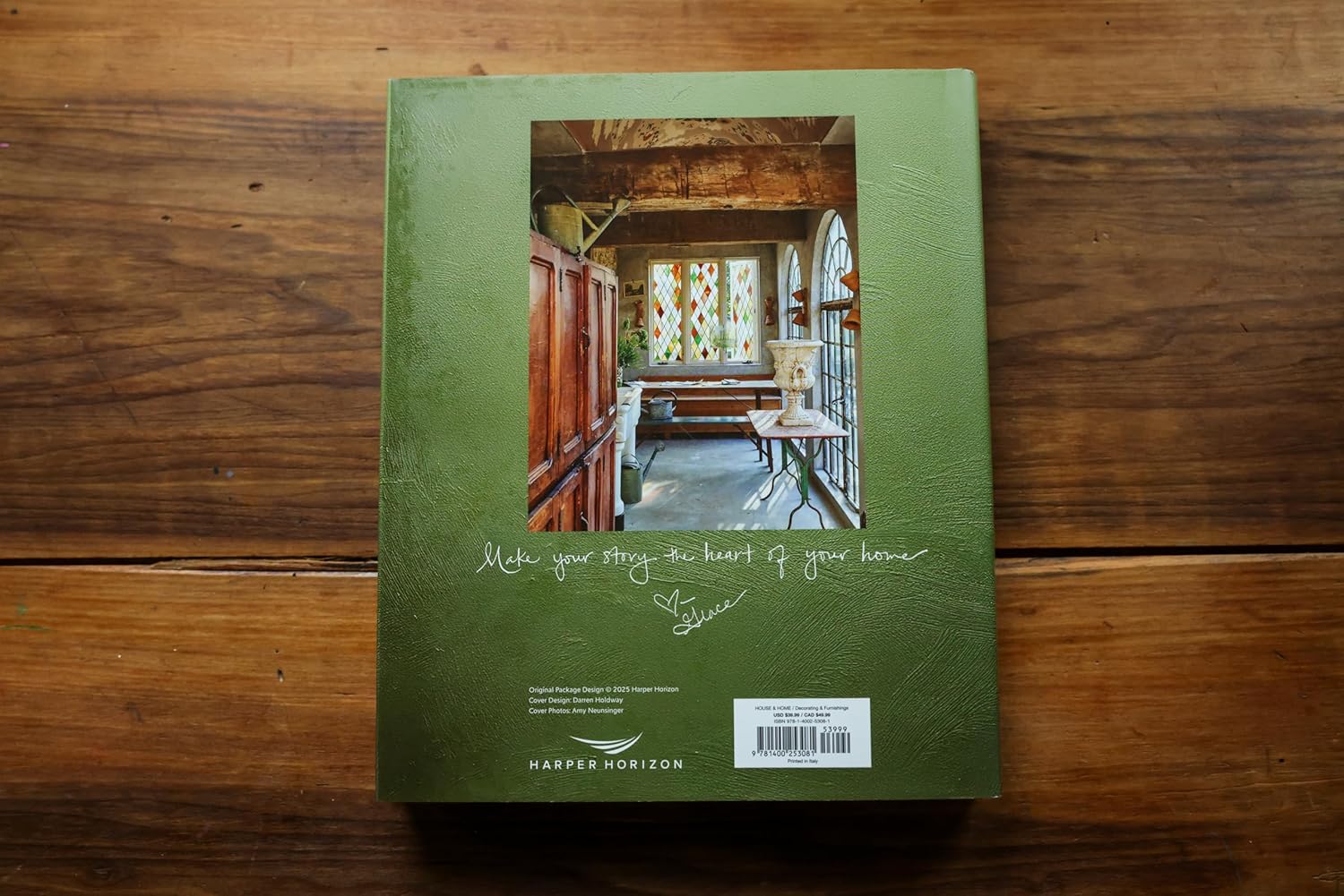 Book in Green, Natural-Brown, and Orange by Jeid Studio
